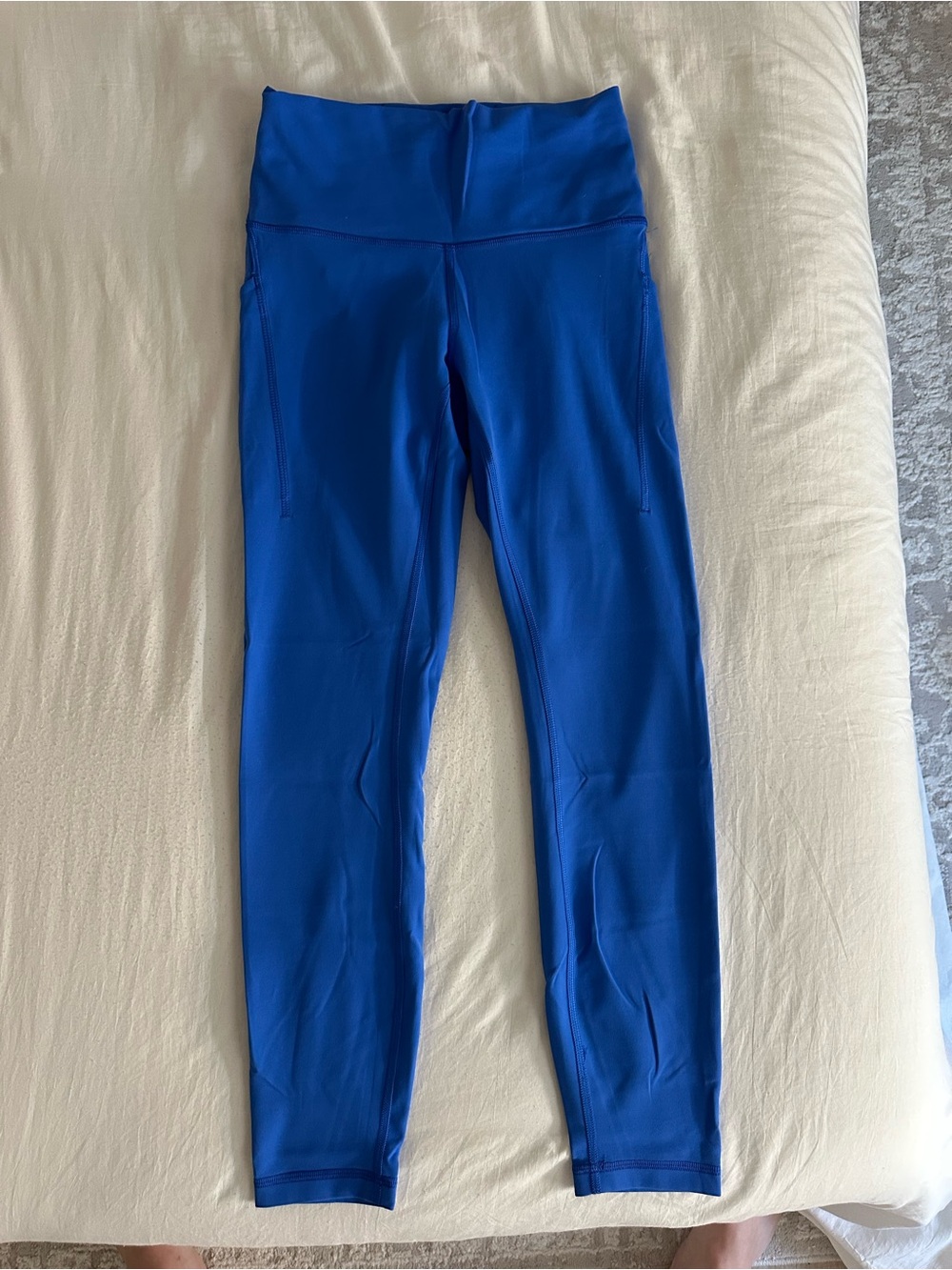 lululemon athletica Wunder Train Leggings w/ Pockets 25”- Cerulean Blue